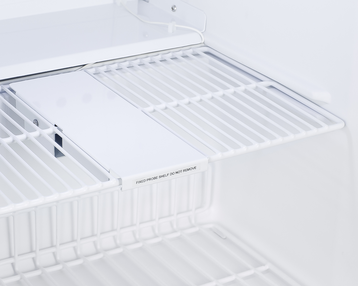 Compact healthcare all-refrigerator with self-closing glass door, front lock, digital controls, and external temperature readout